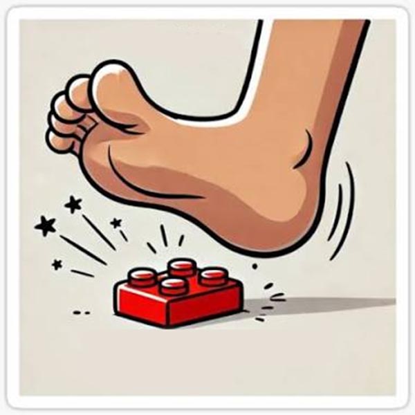 Cartoon of a bare foot about to step on a red LEGO brick
